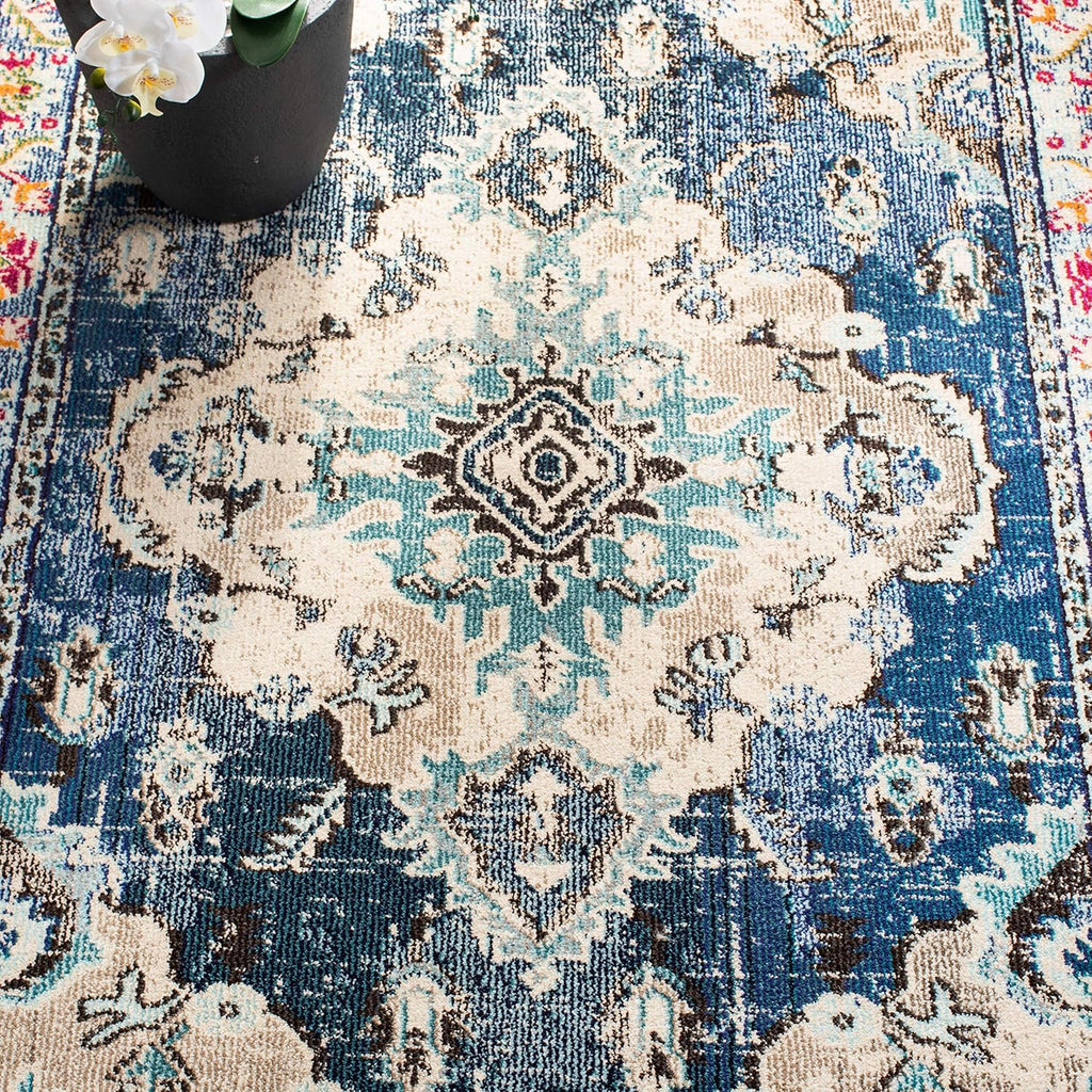 SAFAVIEH Monaco Collection Area Rug - 9' x 12', Navy & Light Blue, Non-Shedding & Easy to Clean, Distressed Medallion Design, Ideal for Living Room, Bedroom, Dining Space (MNC243N)