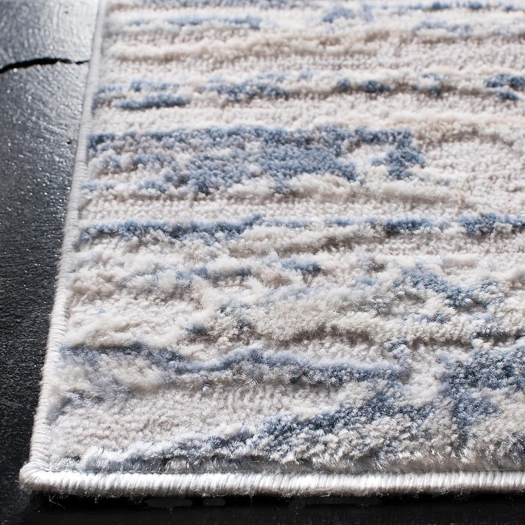 SAFAVIEH Amelia Collection Area Rug - 9' x 12', Ivory & Blue, Modern Abstract Design, Non-Shedding & Easy Care, Ideal for High Traffic Areas in Living Room, Bedroom (ALA768A)