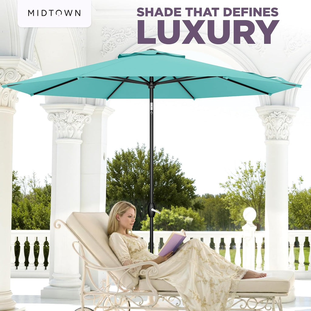 Midtown Umbrellas - The Lean 9 Ft Patio Umbrella with Fade-Resistant Sunbrella Fabric  Auto-Tilt Aluminum Frame and 8 Reinforced Ribs for Deck  Pool & Garden - Aruba Canopy  Black Pole