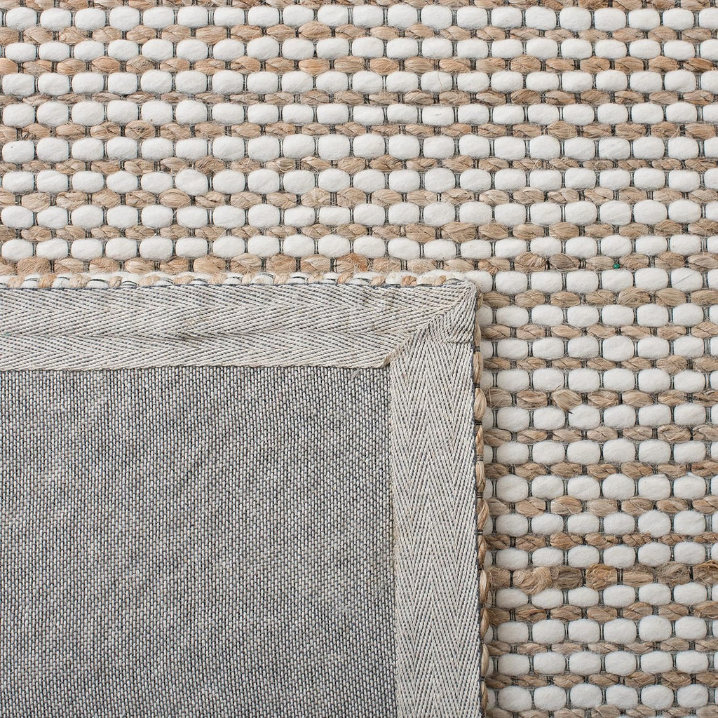 SAFAVIEH Natural Fiber Collection Area Rug - 9' x 12', Natural & Ivory, Handmade Farmhouse Jute & Wool, Ideal for High Traffic Areas in Living Room, Bedroom (NFB553A)