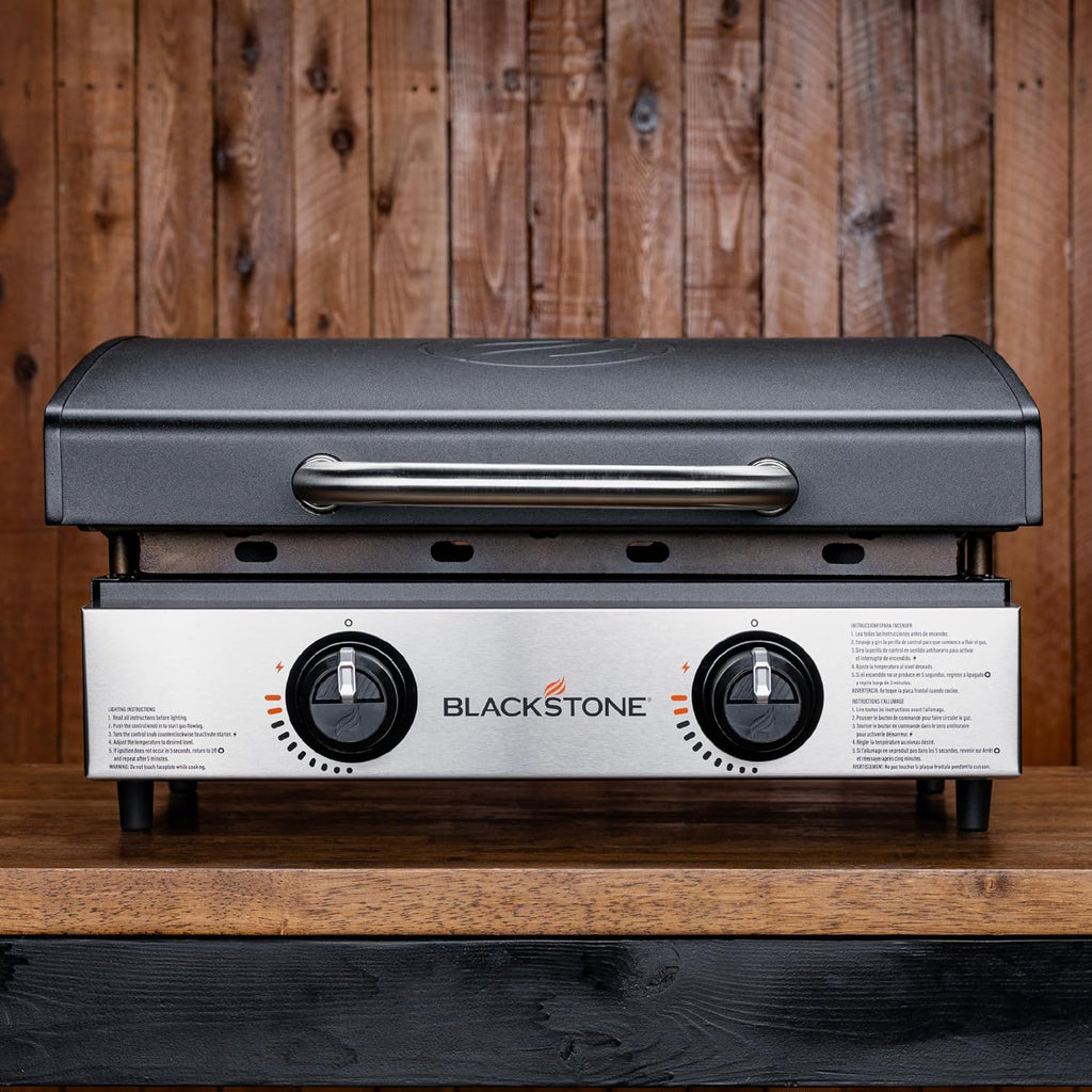 Blackstone 1813 Original 22” Tabletop Griddle with Hood and Stainless Steel Front Plate  Powder Coated Steel  Black